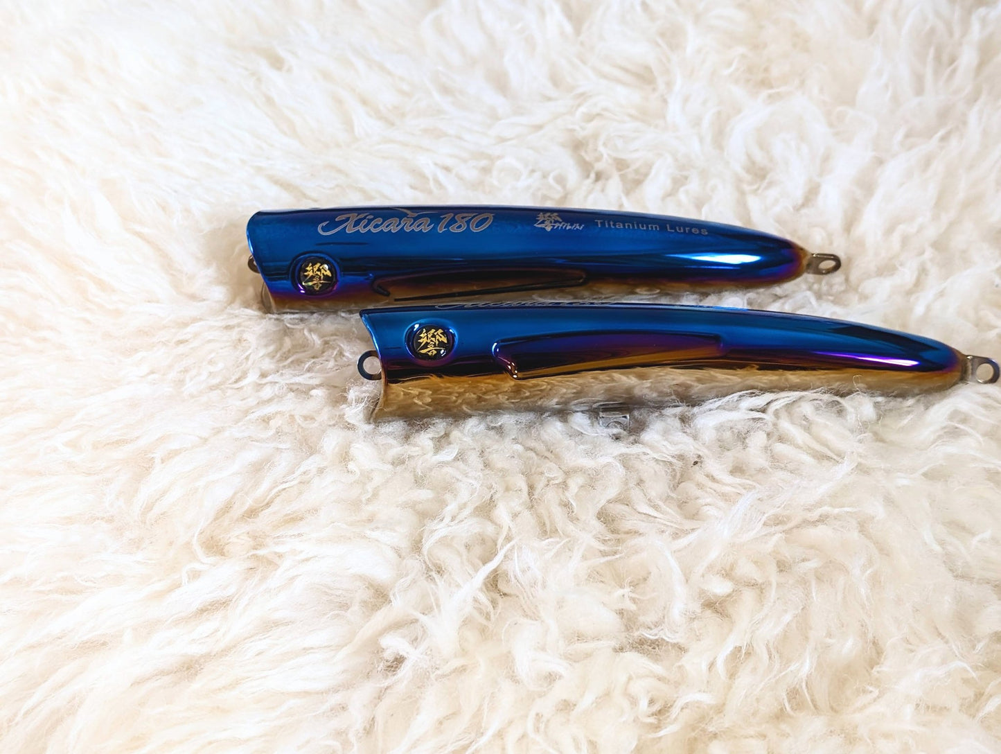 2 Hibiki Xicara 180 titanium popers side view, whiite fur background