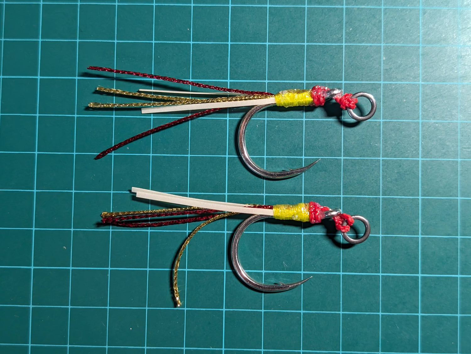 a pair of topwater lure assist hooks