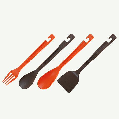 Set of four kitchen utensils including a fork, spoon, and two spatulas on a white background.