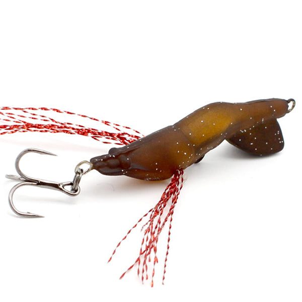 Brown fishing lure with red skirt on a white background