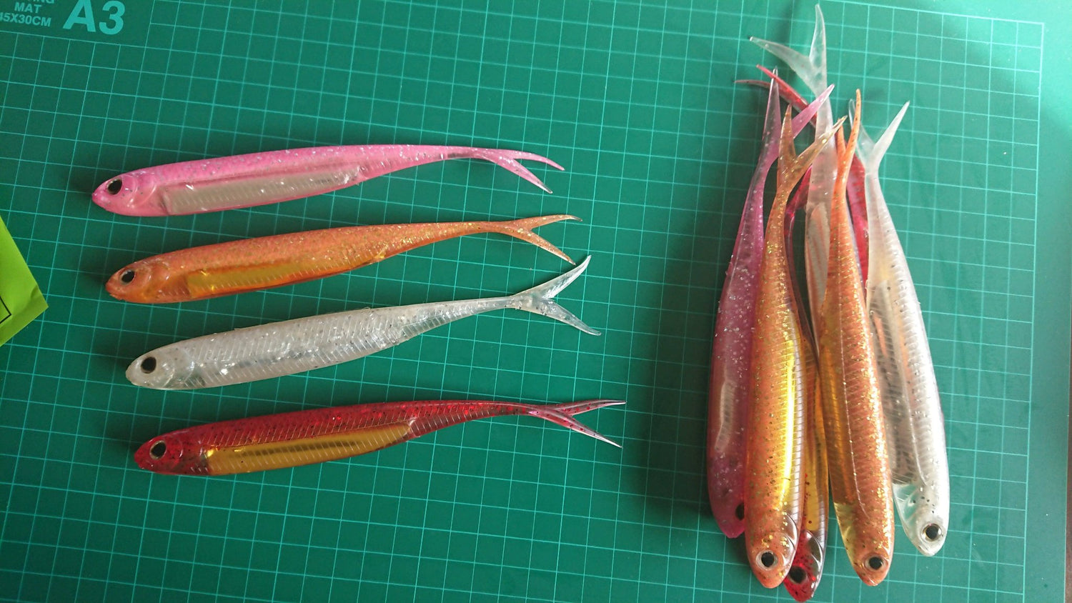 split tail soft baits pink orange silver red colours